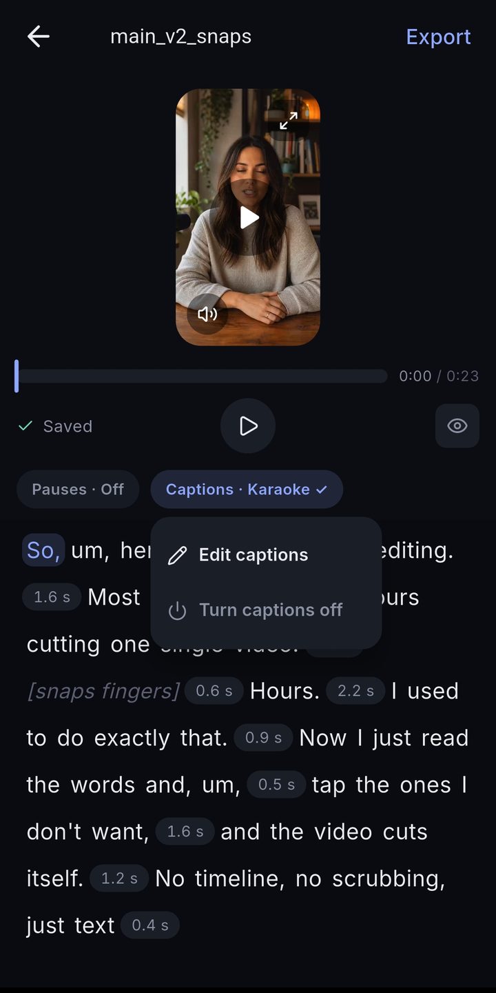 The transcript editor with a Captions menu opened above a struck-out word